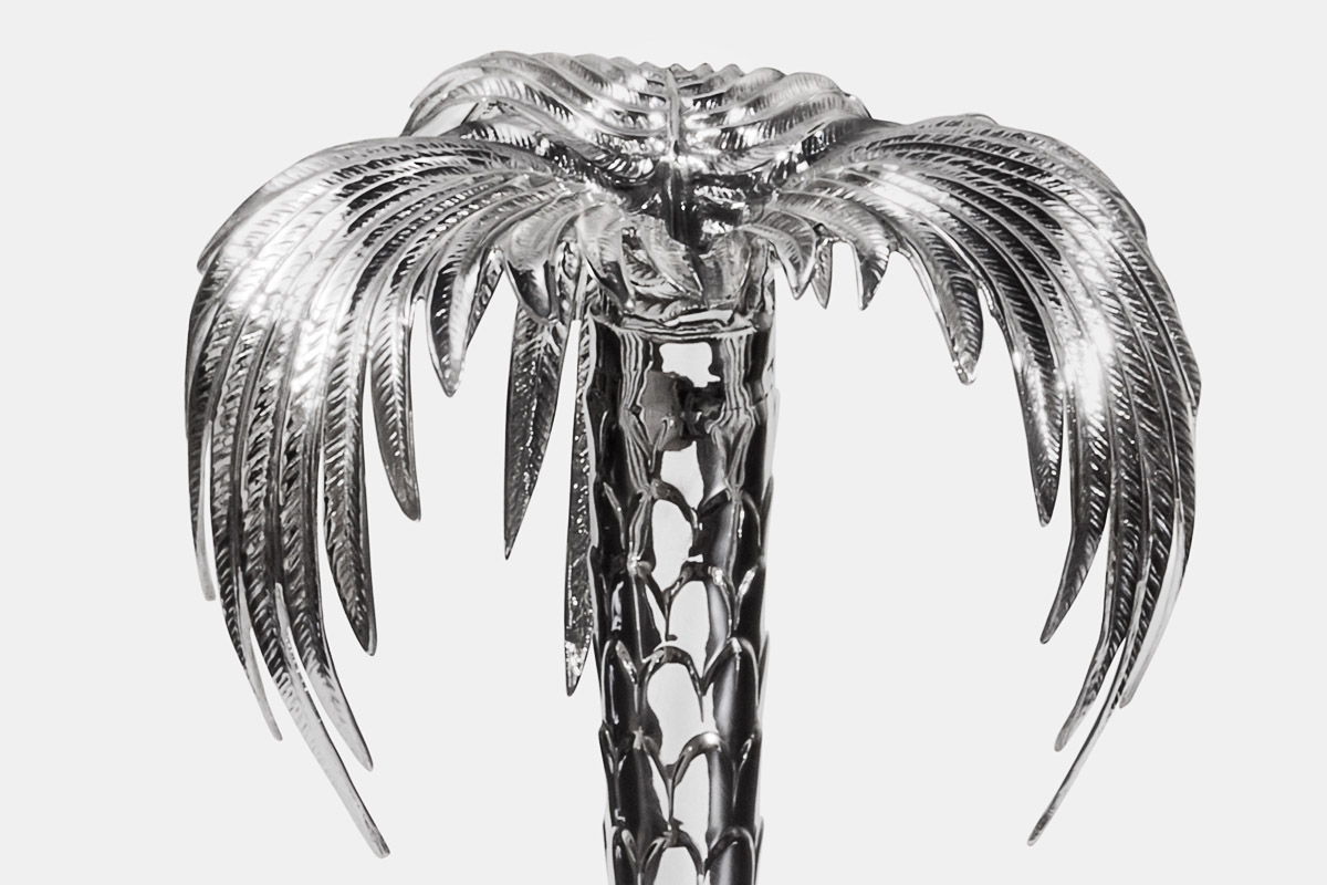 Photo of Michael Galmer's sterling silver 'Palm Candlestick' from his exhibit at Evergreen Museum.