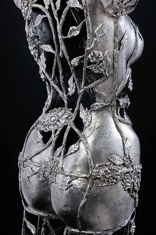Torso Michael Galmer's silver sculpture 'Chrysanthemum Woman'.