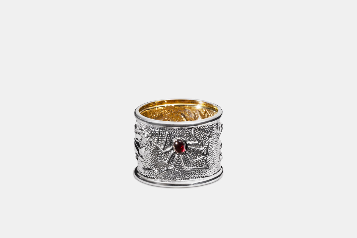 Sterling silver and 24K gold 'Spider Napkin Ring' designed by Michael Galmer.