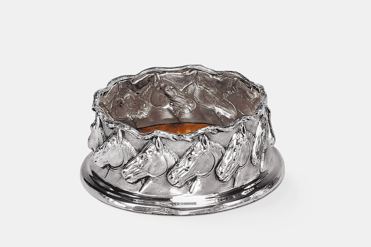 Sterling silver and 24K gold 'Horses Wine Coaster' designed by Michael Galmer.