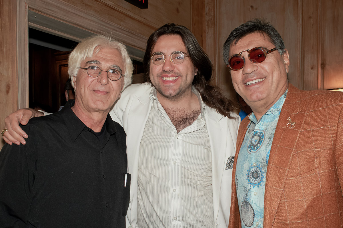 Photo of silver sculpture artist Michael Galmer at the 'Tears of the Holocaust' opening reception at Holocaust Museum.